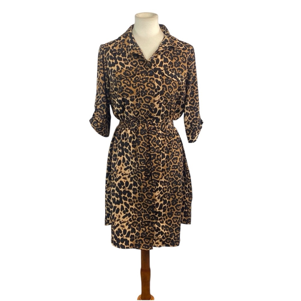 Woman’s Millenium animal print button down dress size L